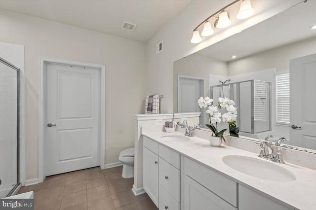 14219 Belle Ave, Culpeper, VA 22701 - bathroom with a stall shower, double vanity, toilet, tile patterned flooring, and baseboards