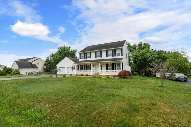 82 Pheasant Run, Waynesboro, VA 22980 - colonial-style house featuring a porch, a front lawn, and a detached garage