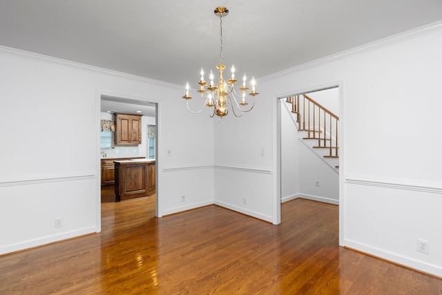 82 Pheasant Run, Waynesboro, VA 22980 - unfurnished dining area featuring a chandelier, wood finished floors, ornamental molding, stairs, and baseboards