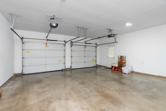 82 Pheasant Run, Waynesboro, VA 22980 - garage with a garage door opener and baseboards