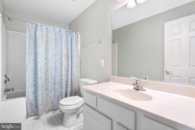 bathroom with shower / bath combo with shower curtain, toilet, tile patterned flooring, and vanity