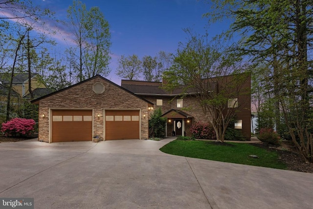 208 Mt Pleasant Dr, Locust Grove, VA 22508 - view of front of home featuring driveway, stone siding, and an attached garage