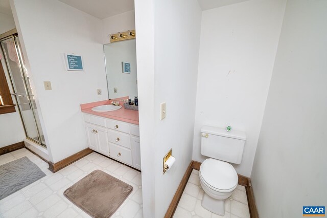 5722 James River Rd, Gladstone, VA 24553 - bathroom with toilet, a shower stall, baseboards, and vanity