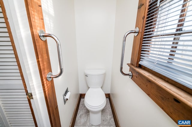 5722 James River Rd, Gladstone, VA 24553 - bathroom featuring tile patterned floors, toilet, and baseboards