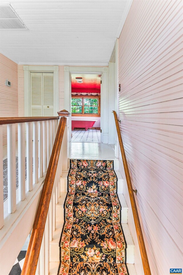 5722 James River Rd, Gladstone, VA 24553 - stairs featuring crown molding and wooden walls