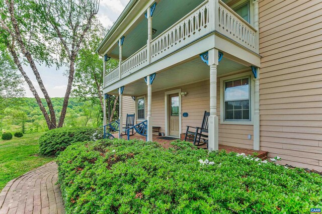 5722 James River Rd, Gladstone, VA 24553 - view of exterior entry featuring a balcony and a porch
