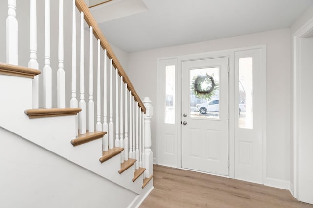 208 Weaver St, Gordonsville, VA 22942 - entrance foyer with stairway, wood finished floors, and baseboards