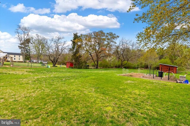 8954 Courthouse Rd, Spotsylvania, VA 22553 - view of grassy yard featuring an outdoor structure and a shed