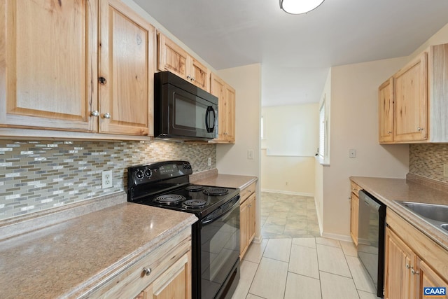 1216 Grove St, Charlottesville, VA 22903 - kitchen featuring black appliances, light brown cabinetry, tasteful backsplash, baseboards, and light countertops