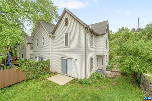 1216 Grove St, Charlottesville, VA 22903 - back of property featuring central AC and roof with shingles