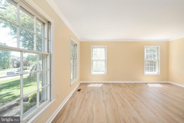 6904 Lakeland Way, Fredericksburg, VA 22407 - spare room featuring light wood-style floors and ornamental molding