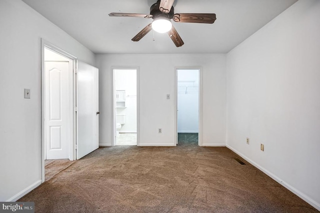 11175 Elwyn Ct, Fredericksburg, VA 22407 - unfurnished bedroom with carpet floors, a spacious closet, baseboards, connected bathroom, and a ceiling fan