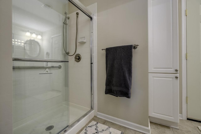 1217 Windsor Rd, Harrisonburg, VA 22801 - bathroom featuring a shower stall, baseboards, and tile patterned flooring
