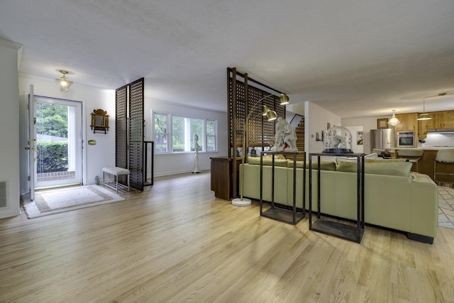 1217 Windsor Rd, Harrisonburg, VA 22801 - living area featuring light wood finished floors, baseboards, and visible vents