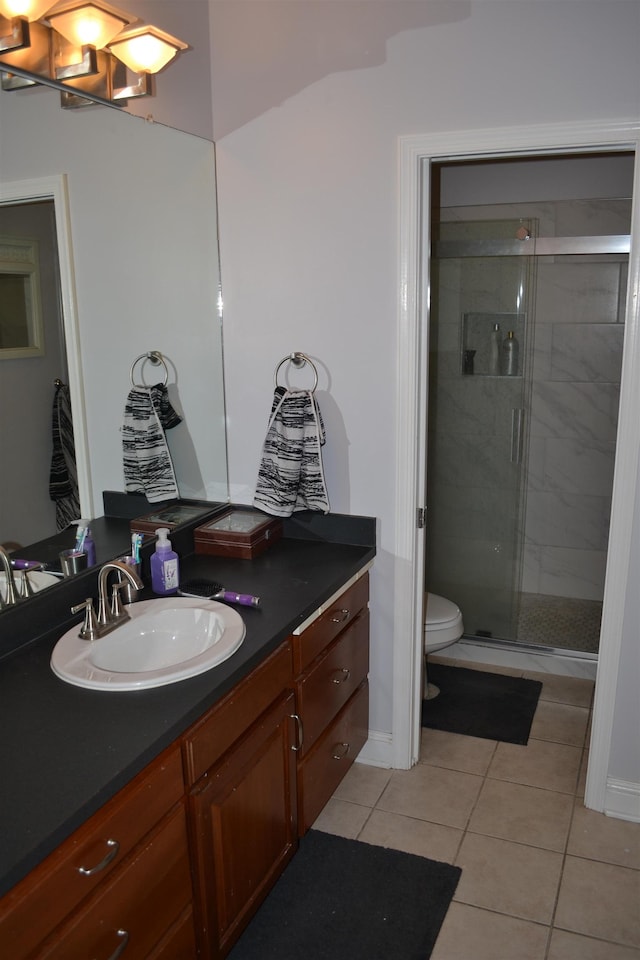 2894 Cullison Ct, Rockingham, VA 22801 - full bath featuring tile patterned flooring, a shower stall, vanity, and toilet