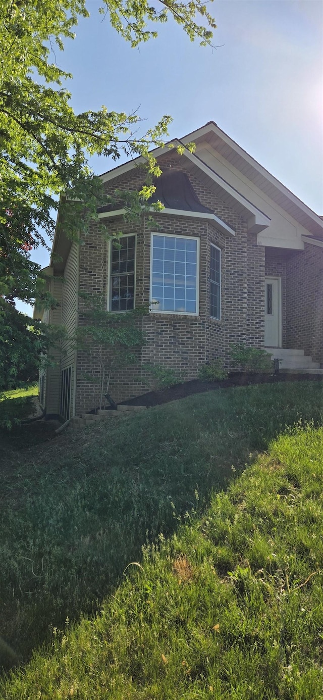 2894 Cullison Ct, Rockingham, VA 22801 - view of side of property featuring brick siding and a yard