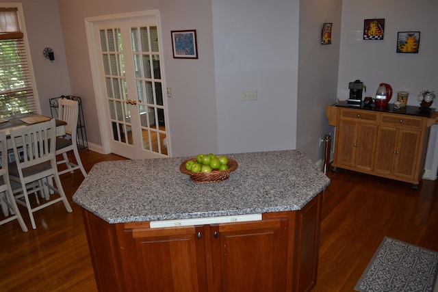 2894 Cullison Ct, Rockingham, VA 22801 - kitchen with dark wood-style floors, brown cabinets, light stone countertops, and baseboards