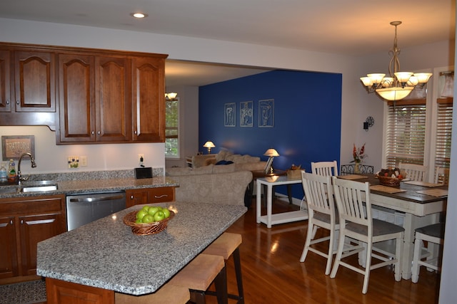 2894 Cullison Ct, Rockingham, VA 22801 - kitchen featuring a sink, a chandelier, stainless steel dishwasher, dark wood-style floors, and stone counters