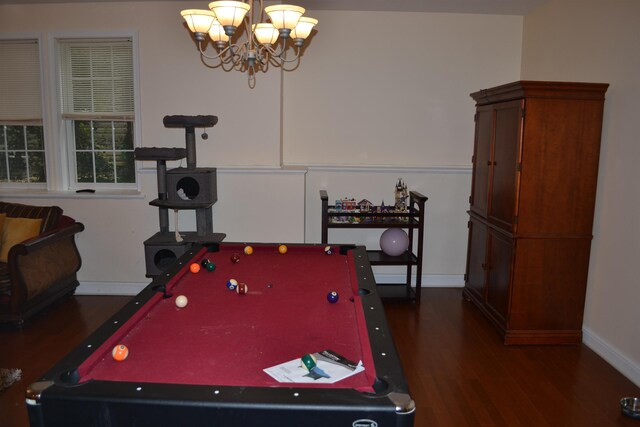 2894 Cullison Ct, Rockingham, VA 22801 - rec room with billiards, wood finished floors, a chandelier, and baseboards