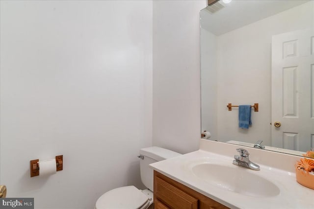 648 Ripplebrook Dr, Culpeper, VA 22701 - half bathroom featuring toilet and vanity