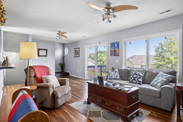872 Camelot Ln, Harrisonburg, VA 22801 - living room with a ceiling fan, a textured ceiling, wood finished floors, and baseboards