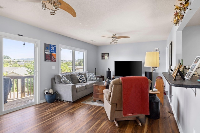 872 Camelot Ln, Harrisonburg, VA 22801 - living area with a ceiling fan, dark wood-style floors, a textured ceiling, and baseboards