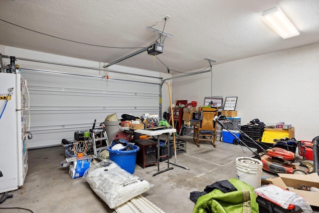 872 Camelot Ln, Harrisonburg, VA 22801 - garage featuring a garage door opener and freestanding refrigerator