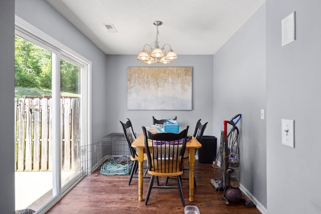 872 Camelot Ln, Harrisonburg, VA 22801 - dining space with a chandelier, wood finished floors, and baseboards