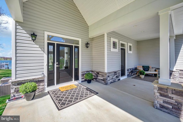 60 Laurelwood Dr, Mineral, VA 23117 - property entrance featuring a porch and stone siding
