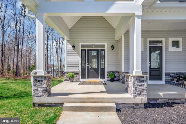 60 Laurelwood Dr, Mineral, VA 23117 - property entrance featuring covered porch and stone siding