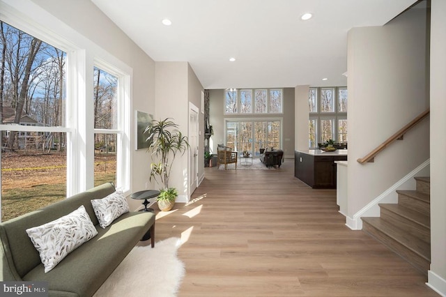 60 Laurelwood Dr, Mineral, VA 23117 - hallway with plenty of natural light, light wood finished floors, stairs, and recessed lighting