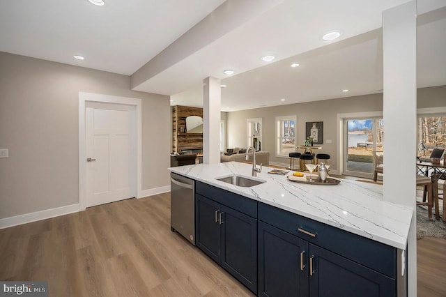 60 Laurelwood Dr, Mineral, VA 23117 - kitchen with light stone counters, light wood finished floors, stainless steel dishwasher, open floor plan, and recessed lighting