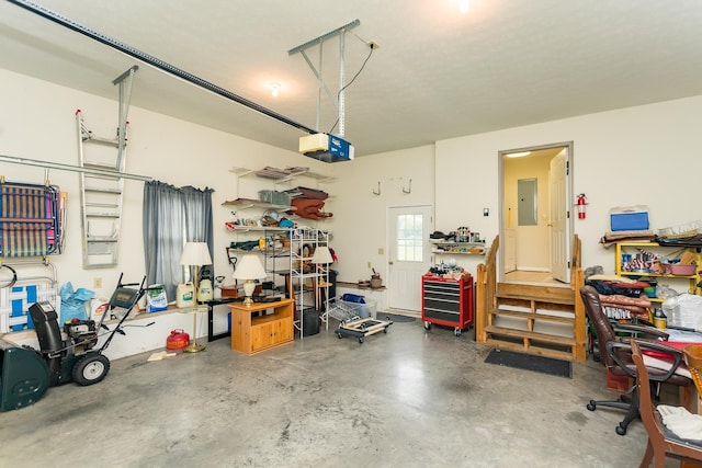 5 Hidden Valley Ct, Fishersville, VA 22939 - garage with electric panel, a garage door opener, and a workshop area