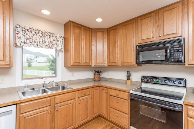 5 Hidden Valley Ct, Fishersville, VA 22939 - kitchen with black microwave, electric range, a sink, white dishwasher, and light countertops
