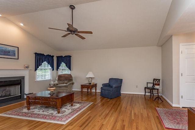 5 Hidden Valley Ct, Fishersville, VA 22939 - living room with lofted ceiling, light wood-style flooring, a ceiling fan, a fireplace with flush hearth, and baseboards
