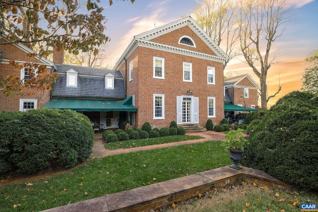 19184 Mt Sharon Rd, Orange, VA 22960 - view of front of property with brick siding, a chimney, and a lawn