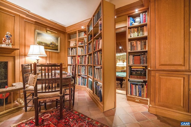 19184 Mt Sharon Rd, Orange, VA 22960 - sitting room with wall of books, tile patterned floors, wood walls, and built in features