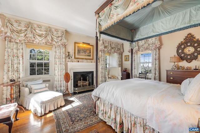 19184 Mt Sharon Rd, Orange, VA 22960 - bedroom featuring multiple windows, a fireplace, crown molding, and wood finished floors