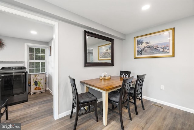 8558 Opal Rd, Warrenton, VA 20186 - dining space with washer / clothes dryer, wood finished floors, and recessed lighting