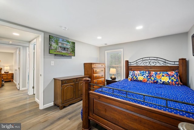 8558 Opal Rd, Warrenton, VA 20186 - bedroom with light wood-style flooring and recessed lighting
