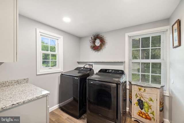 8558 Opal Rd, Warrenton, VA 20186 - laundry area with washer and dryer, light wood finished floors, and recessed lighting