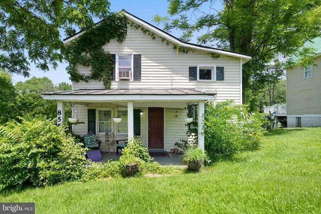 8558 Opal Rd, Warrenton, VA 20186 - view of front of house with a standing seam roof, covered porch, a front lawn, and a metal roof