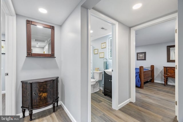 8558 Opal Rd, Warrenton, VA 20186 - corridor with wood finished floors and recessed lighting