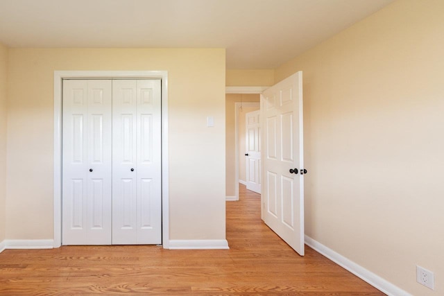 10999 Orkney Grade, Mount Jackson, VA 22842 - unfurnished bedroom featuring light wood finished floors, baseboards, and a closet