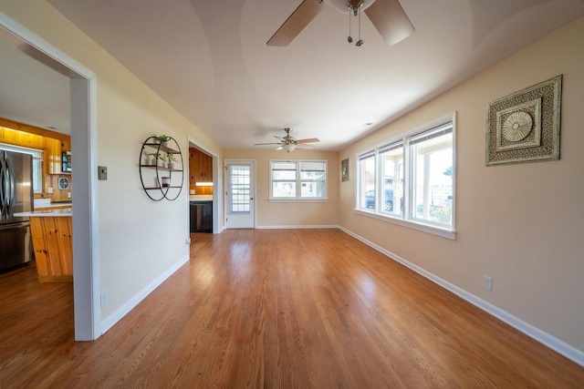 10999 Orkney Grade, Mount Jackson, VA 22842 - unfurnished living room with a ceiling fan, wood finished floors, and baseboards