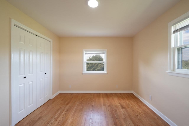 10999 Orkney Grade, Mount Jackson, VA 22842 - unfurnished bedroom with light wood-style floors, baseboards, and a closet