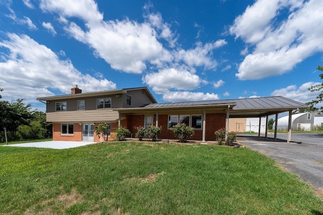 10999 Orkney Grade, Mount Jackson, VA 22842 - view of front of house featuring brick siding, a chimney, a carport, and a front yard