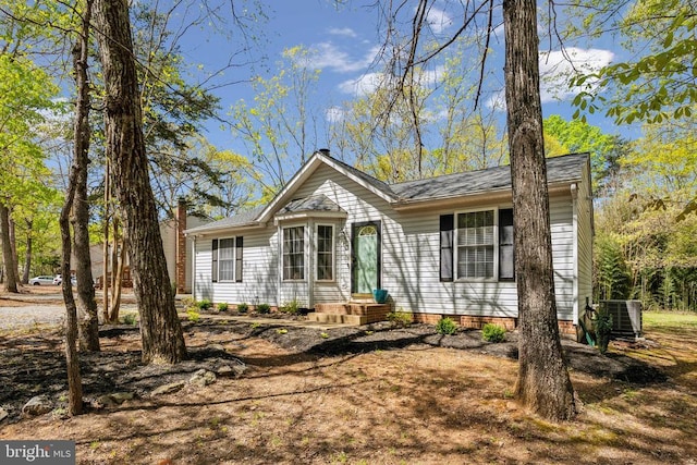 single story home with central air condition unit