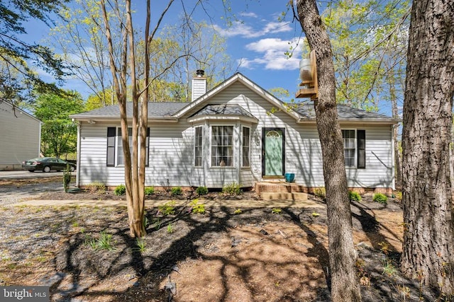 view of front of property with a chimney
