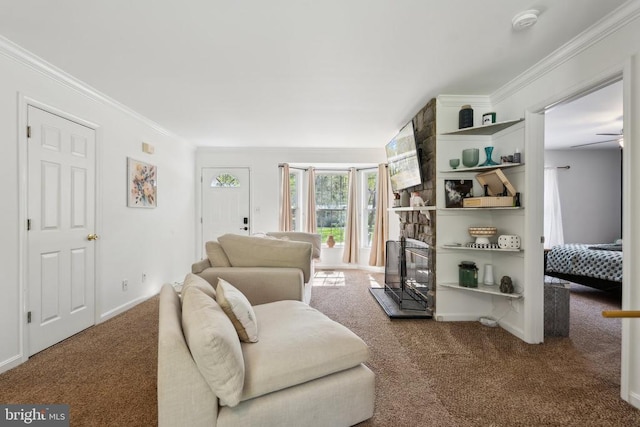 carpeted living area with ornamental molding